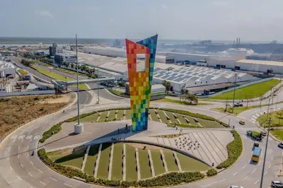 a colorful monument in a city with a road at Espectacular casa en oferta con piscina privada y vista al mar in Carretal