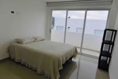 a bedroom with a bed and a large window at Espectacular casa en oferta con piscina privada y vista al mar in Carretal