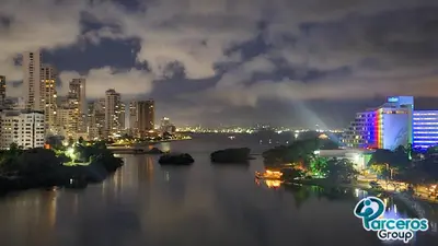 a view of a river with a city at night at Amplio Apartamento Para Grupos Cerca Al Mar Por Parceros Group in Cartagena de Indias