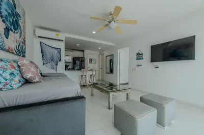 a bedroom with a bed and a ceiling fan at Edificio Morros 3 in Cartagena de Indias