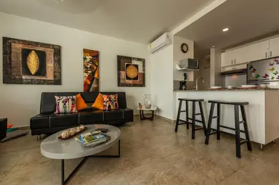 a living room with a couch and a table at Edificio Morros 3 in Cartagena de Indias