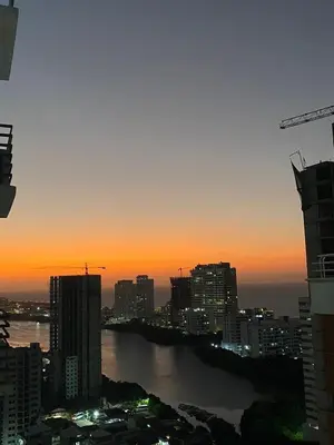 a view of a city skyline at sunset at Apartamento Cerca Playa Marbella in Cartagena de Indias