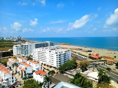 an aerial view of a beach and buildings at Exclusivo apartamento en Cielo Mar-playa las Americas, con maravillosas vistas del atardecer de Cartagena in Cartagena de Indias