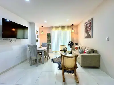 a living room with a couch and a table at Moderno e Iluminado Apartamento in Sincelejo