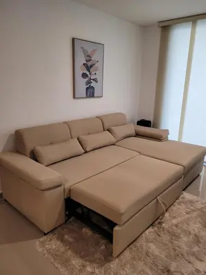a brown couch in a living room at Apartamento cerca al Mar in Cartagena de Indias