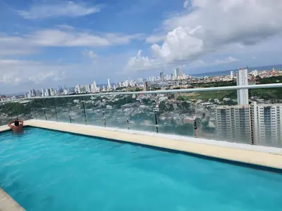 a swimming pool with a view of the city at Apartamento de Lujo, amoblado en Cartagena in Cartagena de Indias