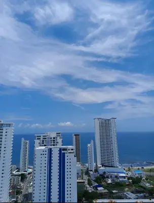 a view of a city with tall buildings and the ocean at Apartamento de Lujo, amoblado en Cartagena in Cartagena de Indias