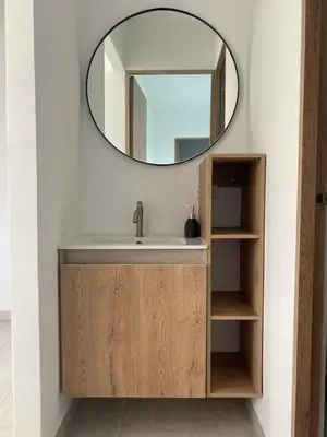 a bathroom with a sink and a mirror at Casa 5 Brisa Piso 2- Palmar De Los Vientos in San Bernardo del Viento