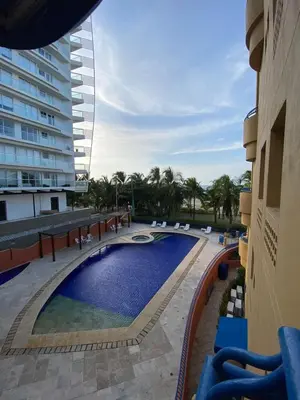 a view of a swimming pool next to a building at YOLO solo se vive una vez - MORROS Cartagena in Cartagena de Indias