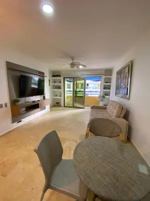 a living room with a couch and a flat screen tv at YOLO solo se vive una vez - MORROS Cartagena in Cartagena de Indias