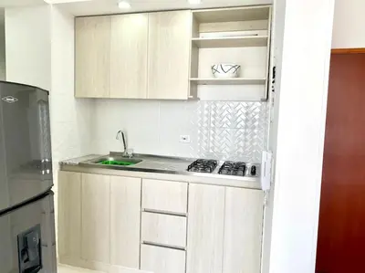 a kitchen with white cabinets and a sink at Apartamento en Cartagena in Cartagena de Indias