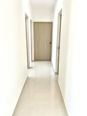 an empty corridor with a door in a building at Apartamento en Cartagena in Cartagena de Indias