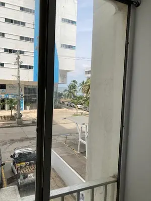 a window with a view of a parking lot at Amazing Ocean View apartment with Pool in Laguito Cartagena in Cartagena de Indias