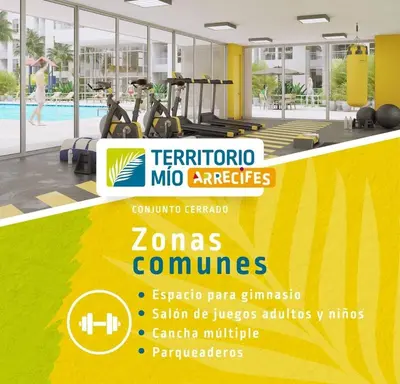 a gym with a yellow counter with cardio machines at habitación cartagena de indias en piso in Cartagena de Indias