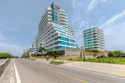 a street with two tall buildings on the side of a road at Apartamento de lujo en Cartagena Seaway935 - Morros in Cartagena de Indias