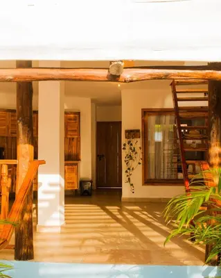 a living room with a ladder in a room at Hb5 Family Room with private bathroom facing the sea in Cartagena de Indias