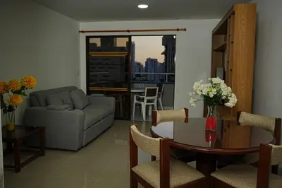 a living room with a couch and a table at Frente al mar, Boca grande APT1105 in Cartagena de Indias