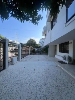 a building with a fence in front of it at ¡La mejor Suite! Lujo, ubicación, precio in Barranquilla