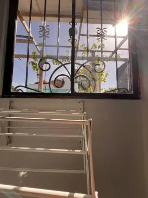 a window in a room with a bench and a light at ¡La mejor Suite! Lujo, ubicación, precio in Barranquilla