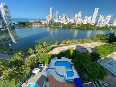 a view of a lake with a city in the background at suite incanto con vista al lago in Cartagena de Indias