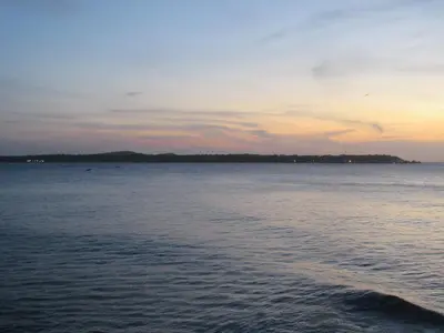 a view of a body of water at sunset at Magia frente al Mar Caribe in Cartagena de Indias
