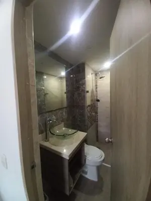 a bathroom with a sink and a toilet at AQUALINASTAR in Cartagena de Indias