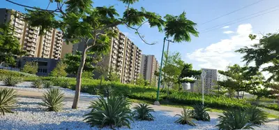 a park with palm trees and plants in front of buildings at Espectacular apartamento piso 14 al norte de Barranquilla in Barranquilla