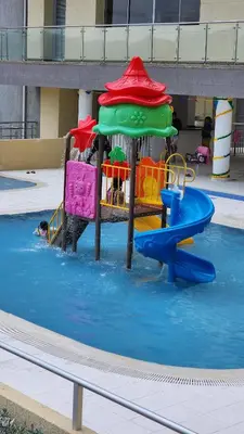 a water park with a water slide in a pool at Espectacular apartamento piso 14 al norte de Barranquilla in Barranquilla