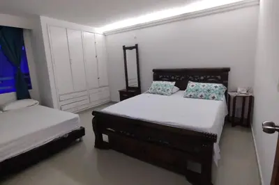 a bedroom with two beds in a room at Confort en la zona del Laguito in Cartagena de Indias