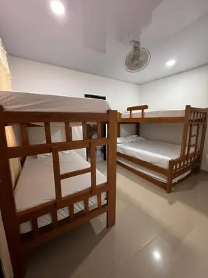 a room with two bunk beds in a room at Summer - Apartamento Sector La Coquerita in Coveñas