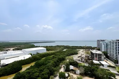 arial view of a city with the ocean in the background at Apartamento 2 dormitorios Morros Vistas. Piscina in Cartagena de Indias