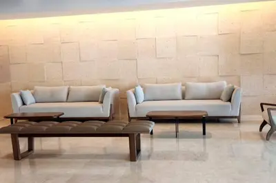 two white couches and tables in a room at Apartamento nuevo en cartagena en el cabrero in Cartagena de Indias