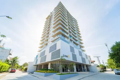 a tall white building with a pyramid top at 1H Encanto Rentals @ Sunno Beach in Cartagena de Indias