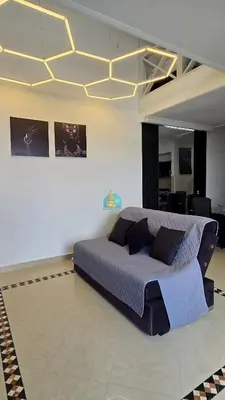 a bedroom with a large bed in a room at Penthouse Duplex Vista 360 Piso 23 in Cartagena de Indias