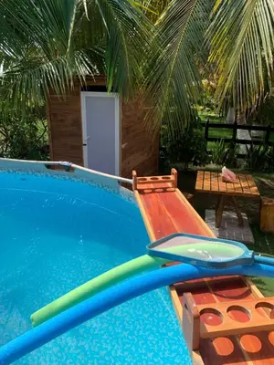 a pool with two inflatable paddles sitting next to it at Cabaña El Esplendor in San Bernardo del Viento