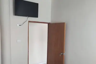 a flat screen tv on top of a wall at Apartamento Dorado Sunset in Santa Marta