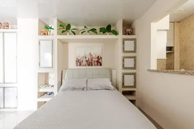 a bedroom with a large bed in a room at Studio at the Resort Residence 2 in Puerto Colombia