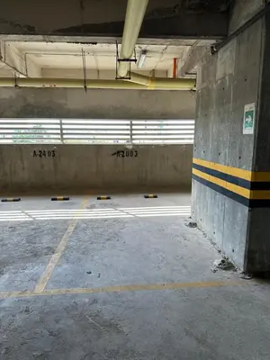 an empty parking garage with graffiti on the wall at Great sunsets & sea views, near beach&downtown in Cartagena de Indias