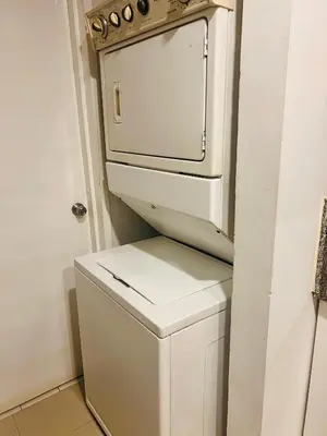 a white stove top oven sitting on top of a refrigerator at Morros EPIC OCEAN AND BEACH in Cartagena de Indias