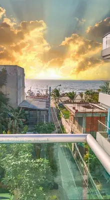 a view of the ocean from the balcony of a building at Casa Playa Boquilla in Cartagena de Indias
