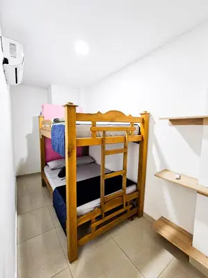 a set of bunk beds in a room at Casa Playa Boquilla in Cartagena de Indias
