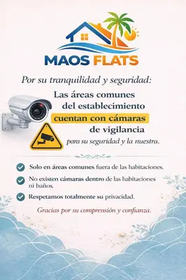 a flyer for a beach resort with a camera on the beach at Maos flats-Habitacion comfort in Cartagena de Indias