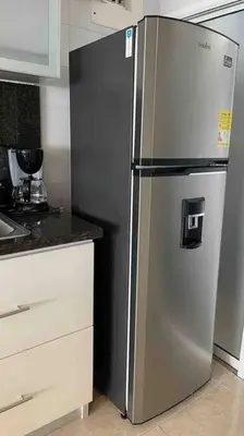 a stainless steel refrigerator in a kitchen at Vacation Home Apartment in Cartagena in Cartagena de Indias