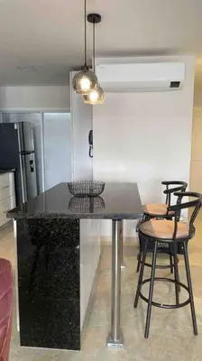 a kitchen with a black counter top in a room at Vacation Home Apartment in Cartagena in Cartagena de Indias