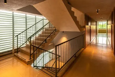 a spiral staircase in a room with a window at Mood Matuna Hotel Cartagena in Cartagena de Indias
