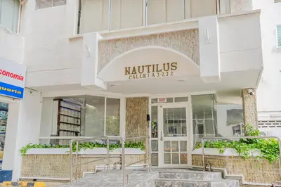 a building with a sign for a book store at Lujoso apartamento con vista al mar in Cartagena de Indias