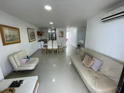 a living room with a couch and a table at Portofino Cartagena Bocagrande 604 ICDI in Cartagena de Indias