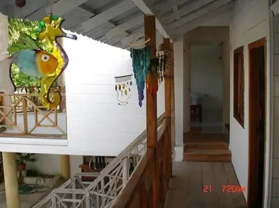 a hallway of a house with a porch and a staircase at La Boquilla, Cartagena, Hospedaje, Turismocolombia-fit in Cartagena de Indias