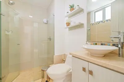 a bathroom with a toilet and a sink and a shower at Sensacional! Apartamento Cartagena Morros SeaWay in Cartagena de Indias