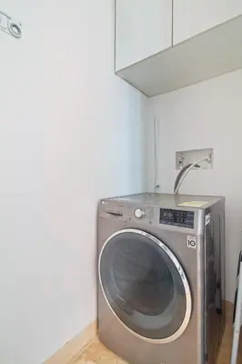 a washing machine in a room with a white wall at Sensacional! Apartamento Cartagena Morros SeaWay in Cartagena de Indias